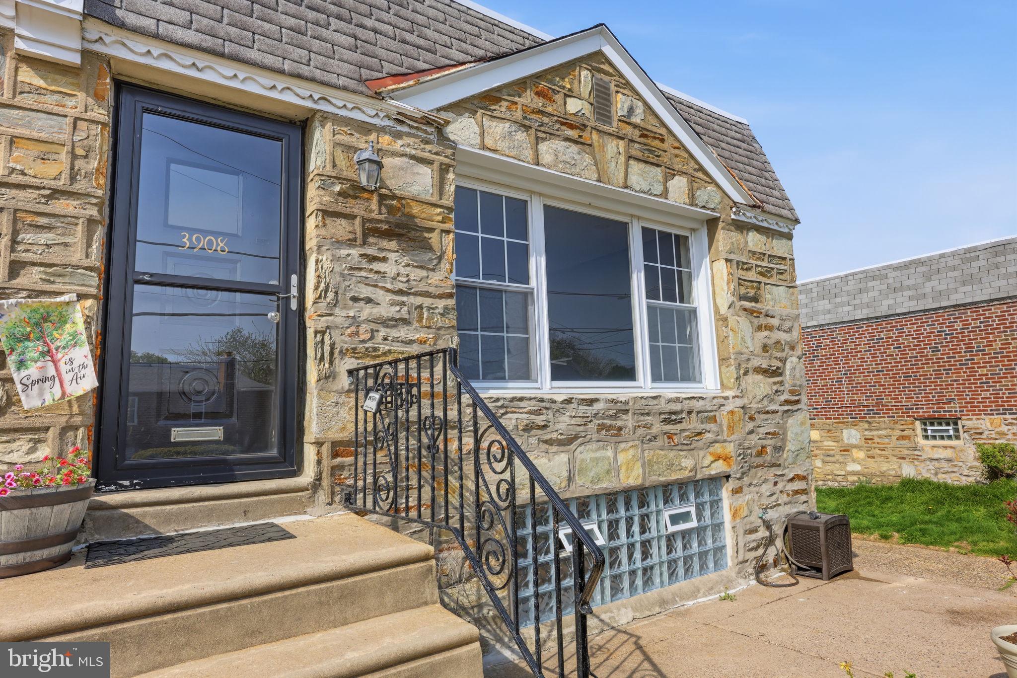 3908 Pearson Avenue Philadelphia, PA 19114 - Photo 2 of 30 a front view of a house with a porch