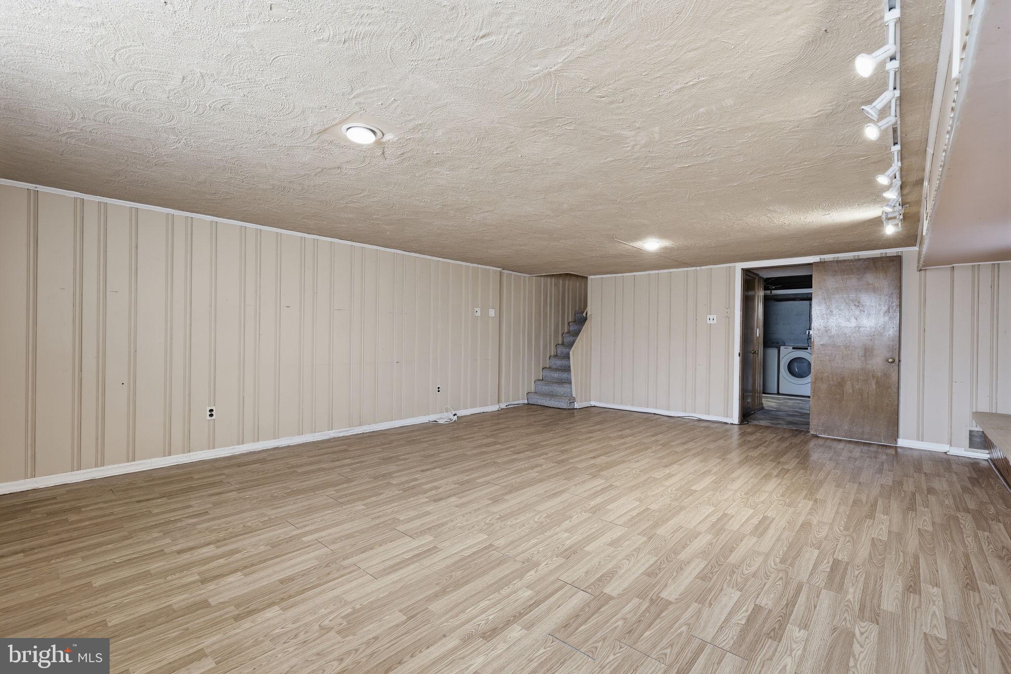 3908 Pearson Avenue Philadelphia, PA 19114 - Photo 23 of 30 a view of an empty room with wooden floor