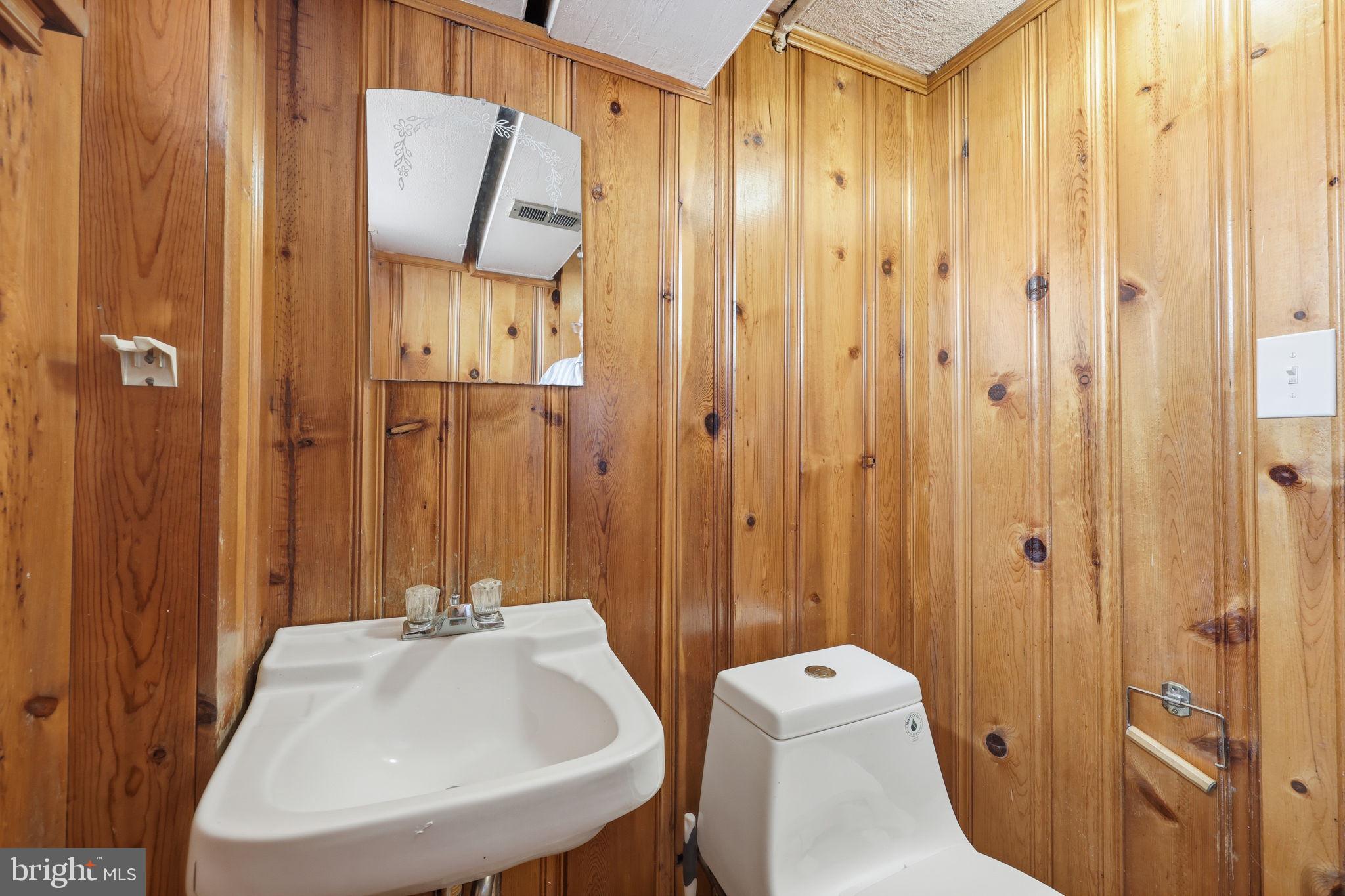 3908 Pearson Avenue Philadelphia, PA 19114 - Photo 24 of 30 a bathroom with a sink a toilet and shower