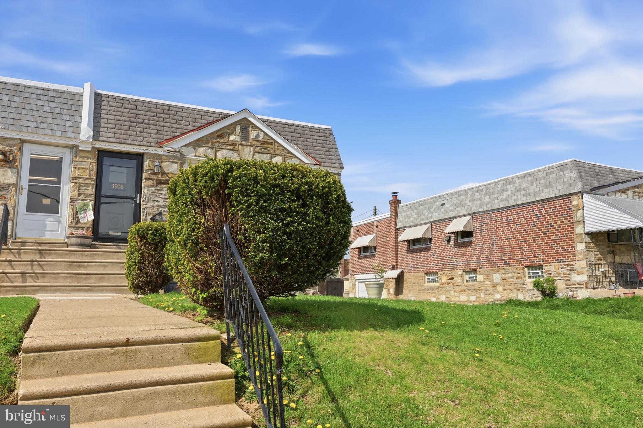 3908 Pearson Avenue Philadelphia, PA 19114 - Photo 3 of 30 a front view of a house with garden