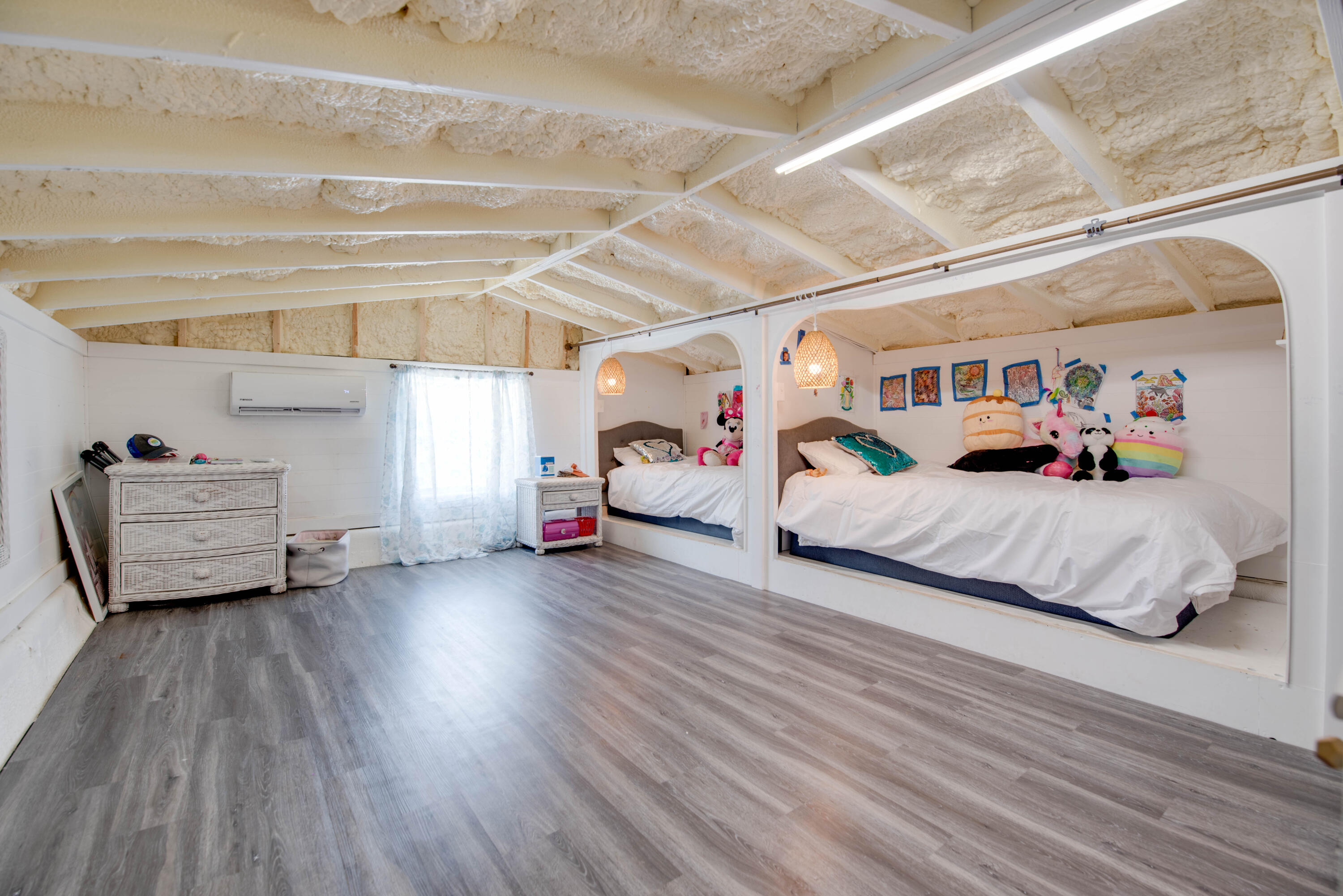 31541 Ave A Big Pine Key, FL 33043 - Photo 15 of 35 a bedroom with furniture and a wooden floor