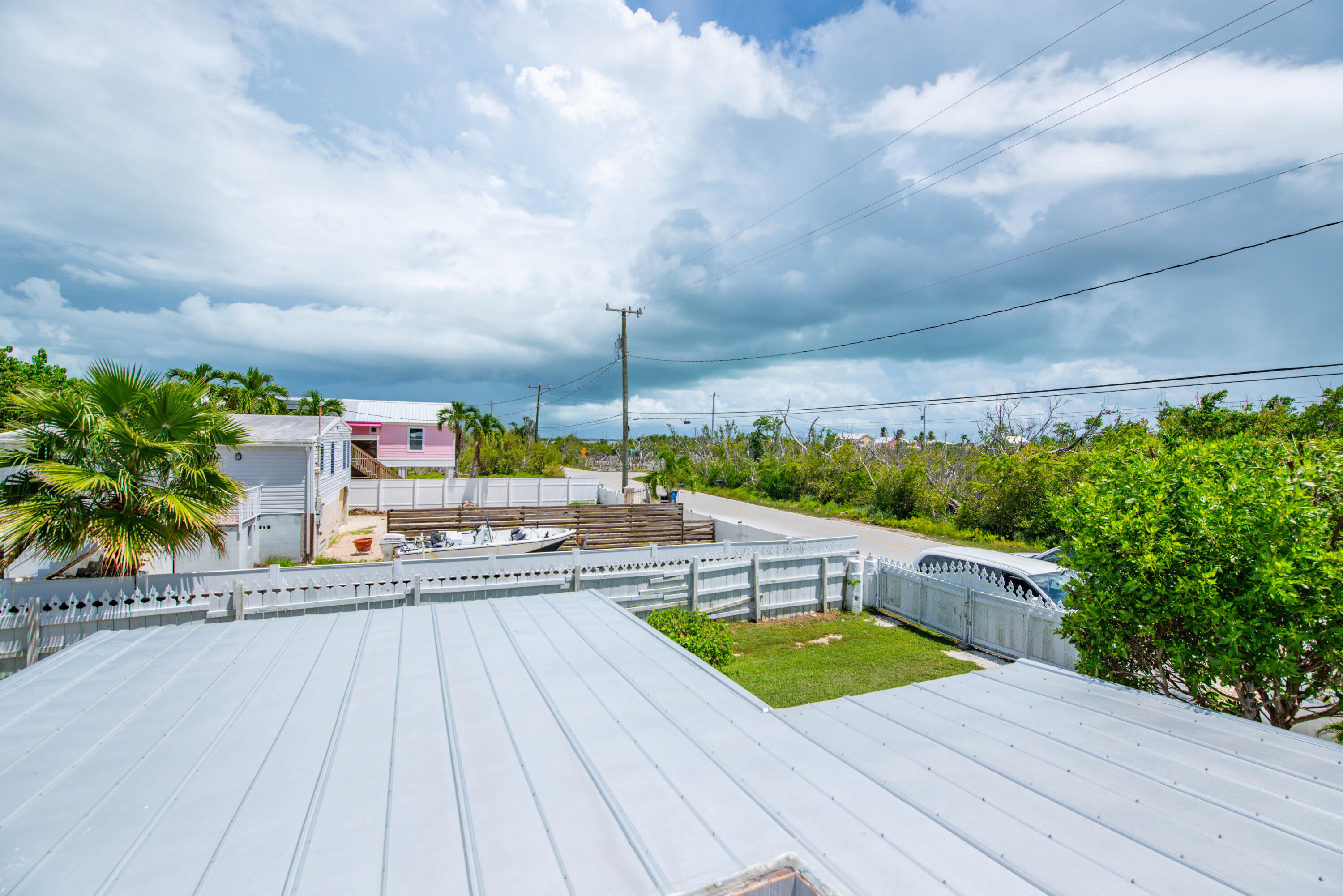 31541 Ave A Big Pine Key, FL 33043 - Photo 23 of 35 a view of a swimming pool with a patio
