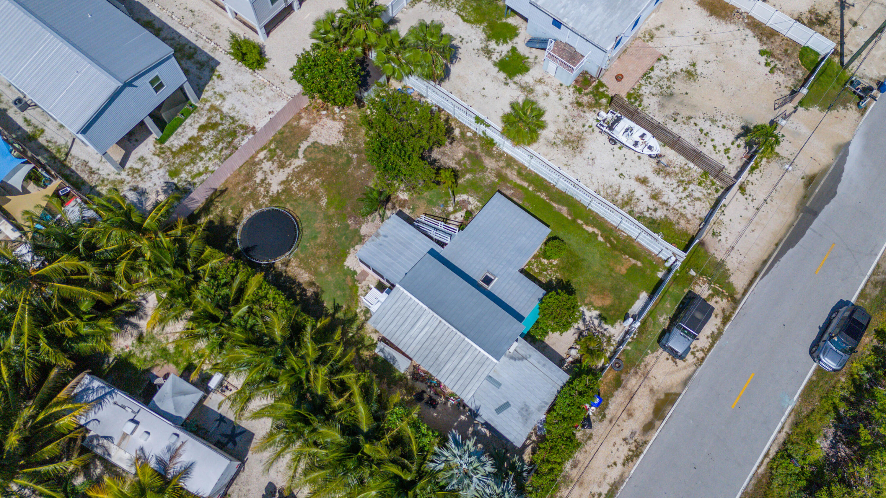 31541 Ave A Big Pine Key, FL 33043 - Photo 30 of 35 an aerial view of a house with a garden