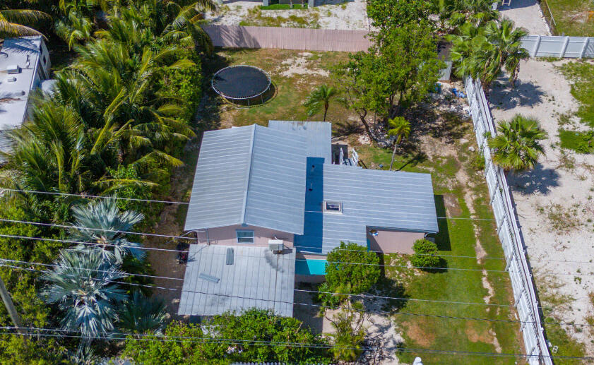 31541 Ave A Big Pine Key, FL 33043 - Photo 34 of 35 an aerial view of a house with garden space and street view