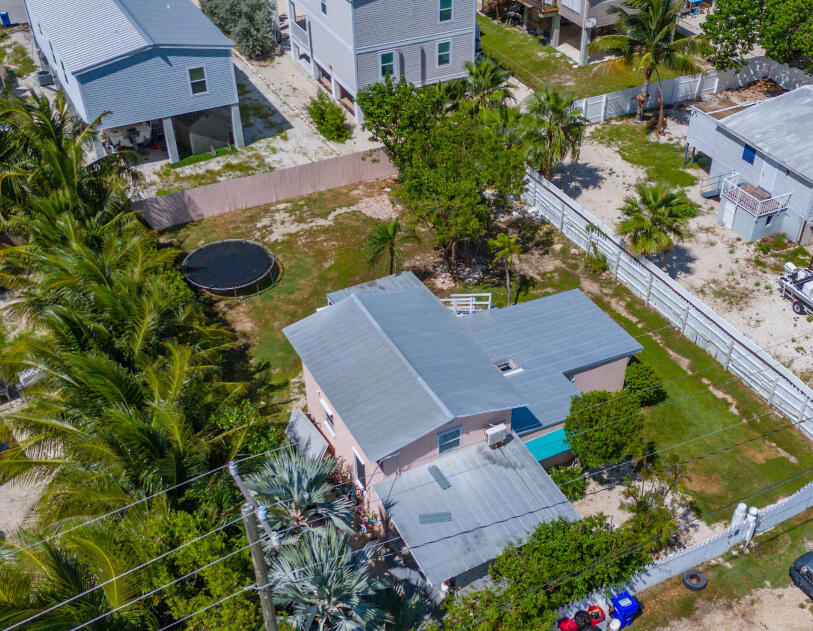 31541 Ave A Big Pine Key, FL 33043 - Photo 35 of 35 an aerial view of a house with yard