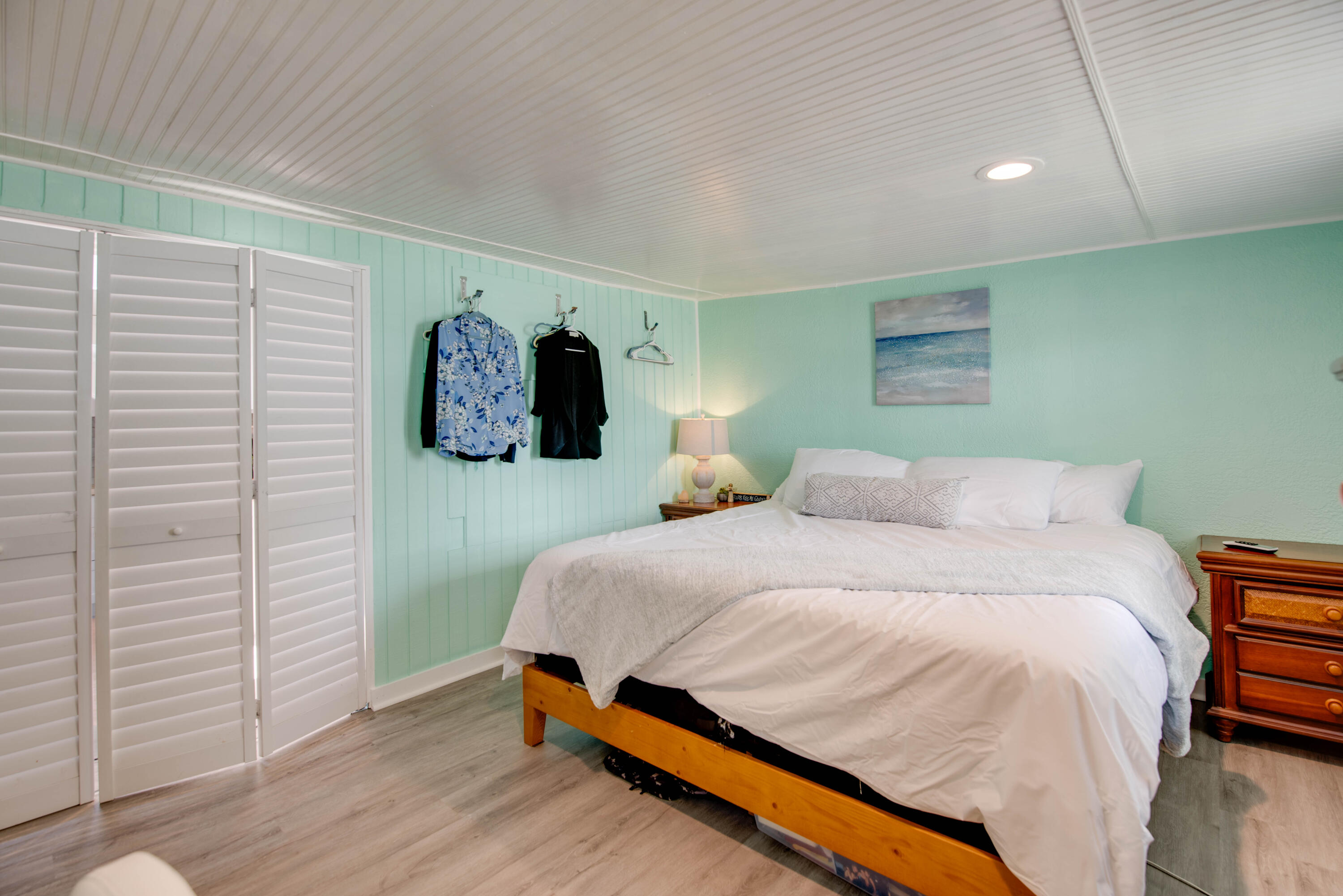 31541 Ave A Big Pine Key, FL 33043 - Photo 6 of 35 a bedroom with a bed and a night stand