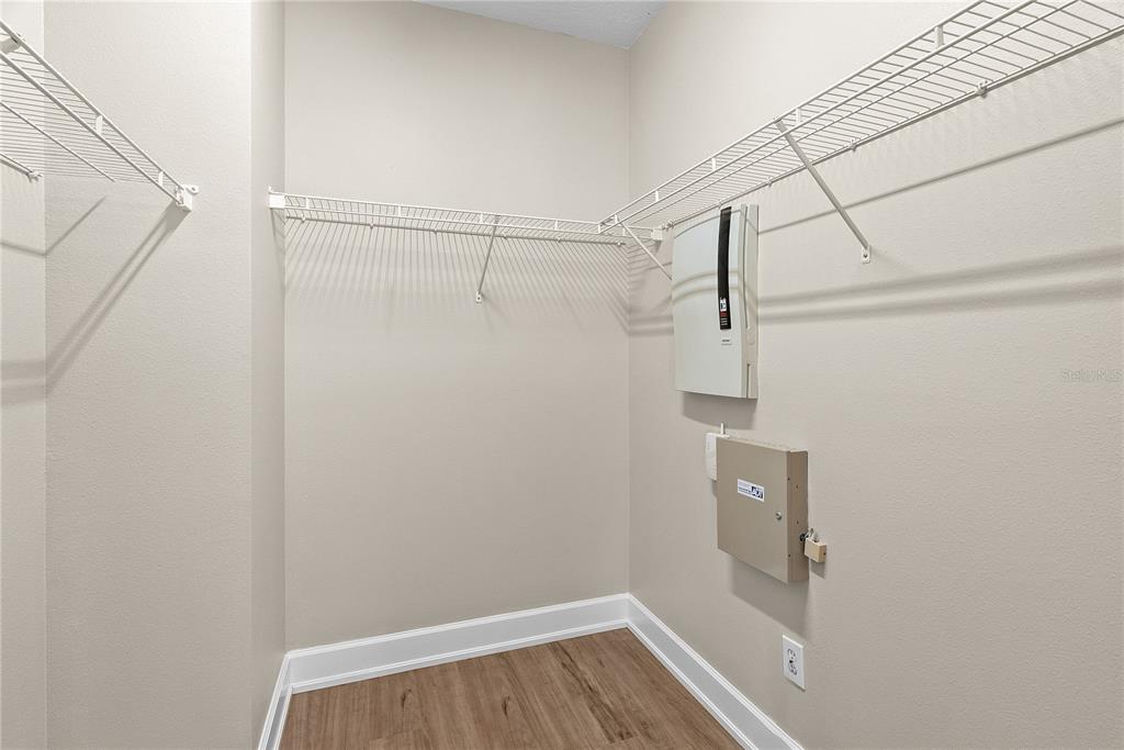 5012 Mirror Ridge Court Lutz, FL 33558 - Photo 21 of 44 a view of a room with racks on the wall