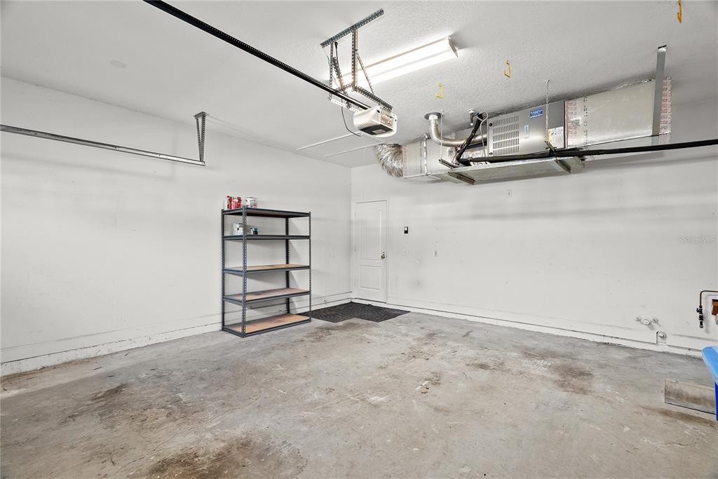 5012 Mirror Ridge Court Lutz, FL 33558 - Photo 36 of 44 a view of a room with racks on the wall