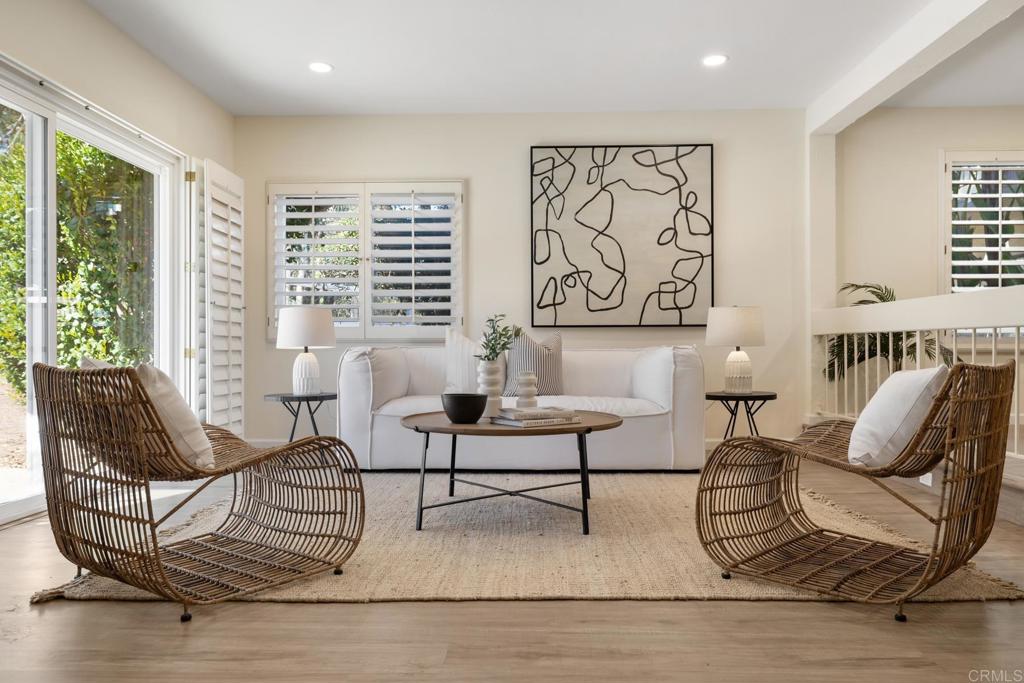 3163 Via De Caballo Encinitas, CA 92024 - Photo 11 of 23 a living room with furniture and a large window