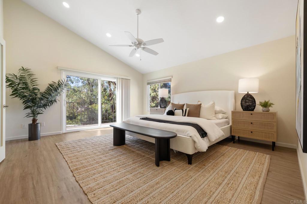3163 Via De Caballo Encinitas, CA 92024 - Photo 14 of 23 a bed room with a bed and a potted plant