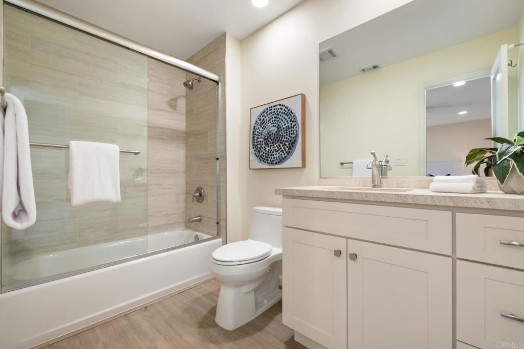 3163 Via De Caballo Encinitas, CA 92024 - Photo 19 of 23 a bathroom with a sink toilet and shower