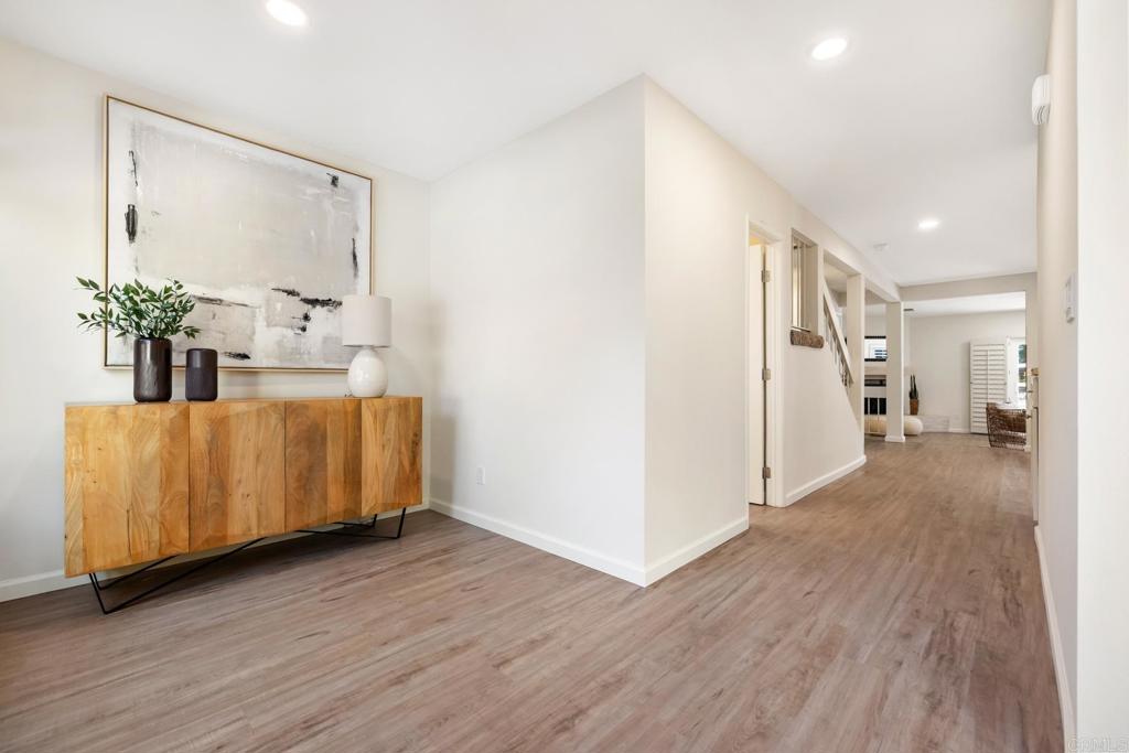 3163 Via De Caballo Encinitas, CA 92024 - Photo 8 of 23 a view of a room with wooden floor and bathroom