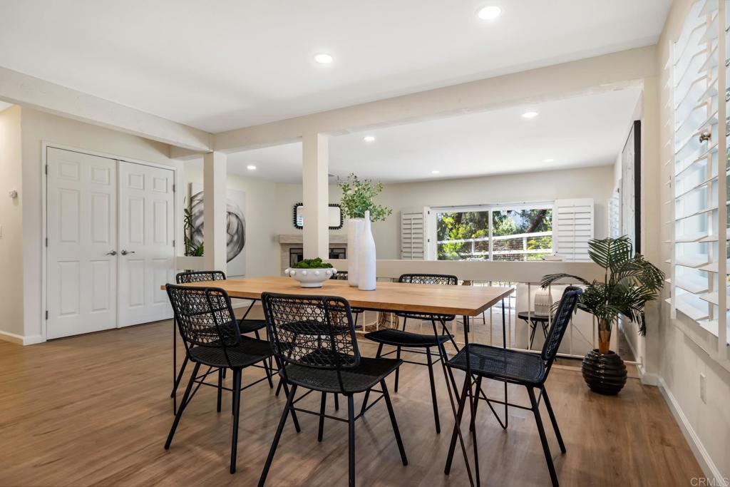 3163 Via De Caballo Encinitas, CA 92024 - Photo 9 of 23 a view of a dining room with furniture and wooden floor