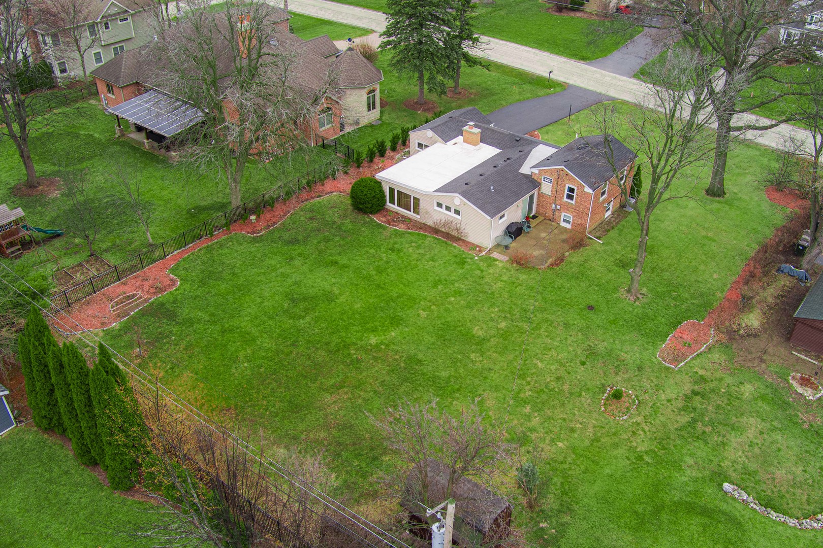 206 Elm Street Prospect Heights, IL 60070 - Photo 4 of 8 an aerial view of a house with a garden