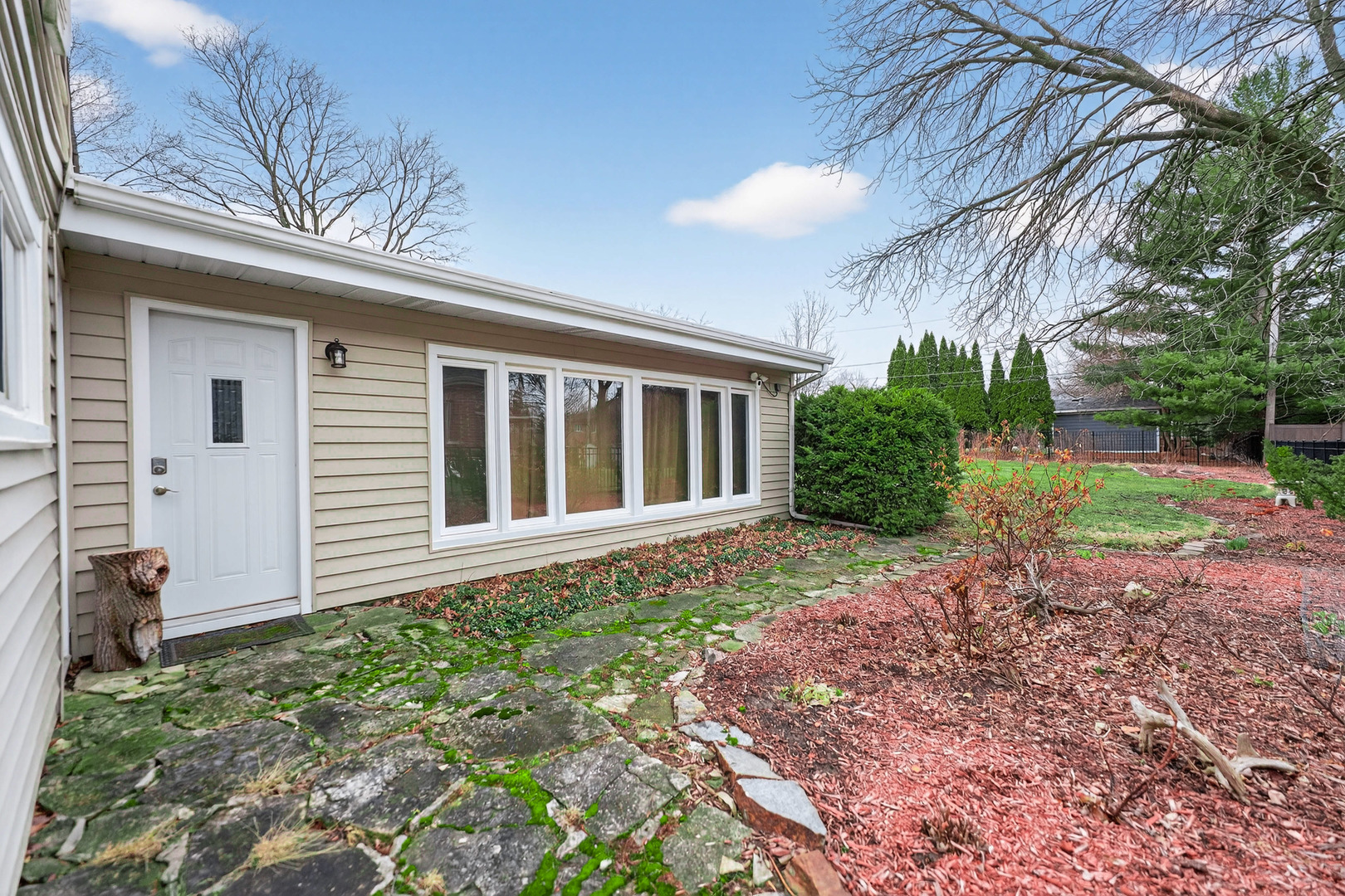 206 Elm Street Prospect Heights, IL 60070 - Photo 5 of 8 a view of a house with a backyard
