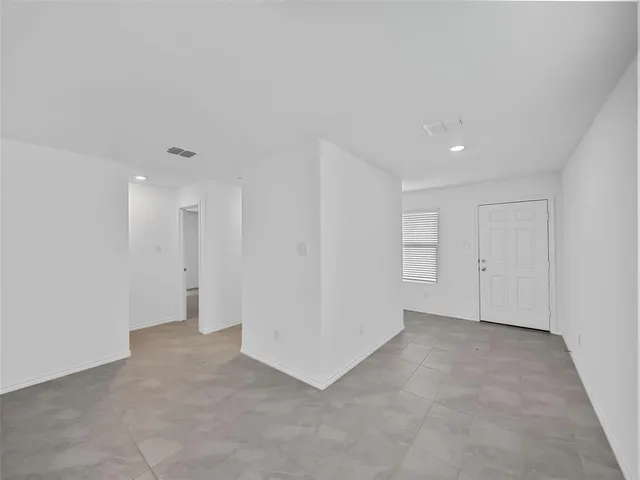 a view of a kitchen with a sink