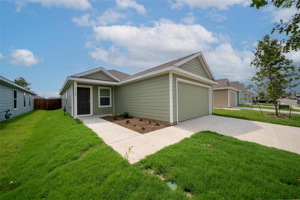 7765 Ruellia Road McKinney, TX 75071 - Photo 3 of 40 a front view of house with yard and green space