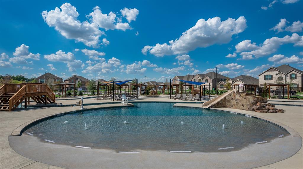 7765 Ruellia Road McKinney, TX 75071 - Photo 38 of 40 a view of a swimming pool with outdoor seating