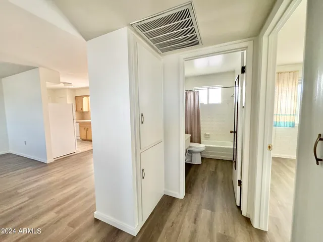 a view of a bathroom with a toilet