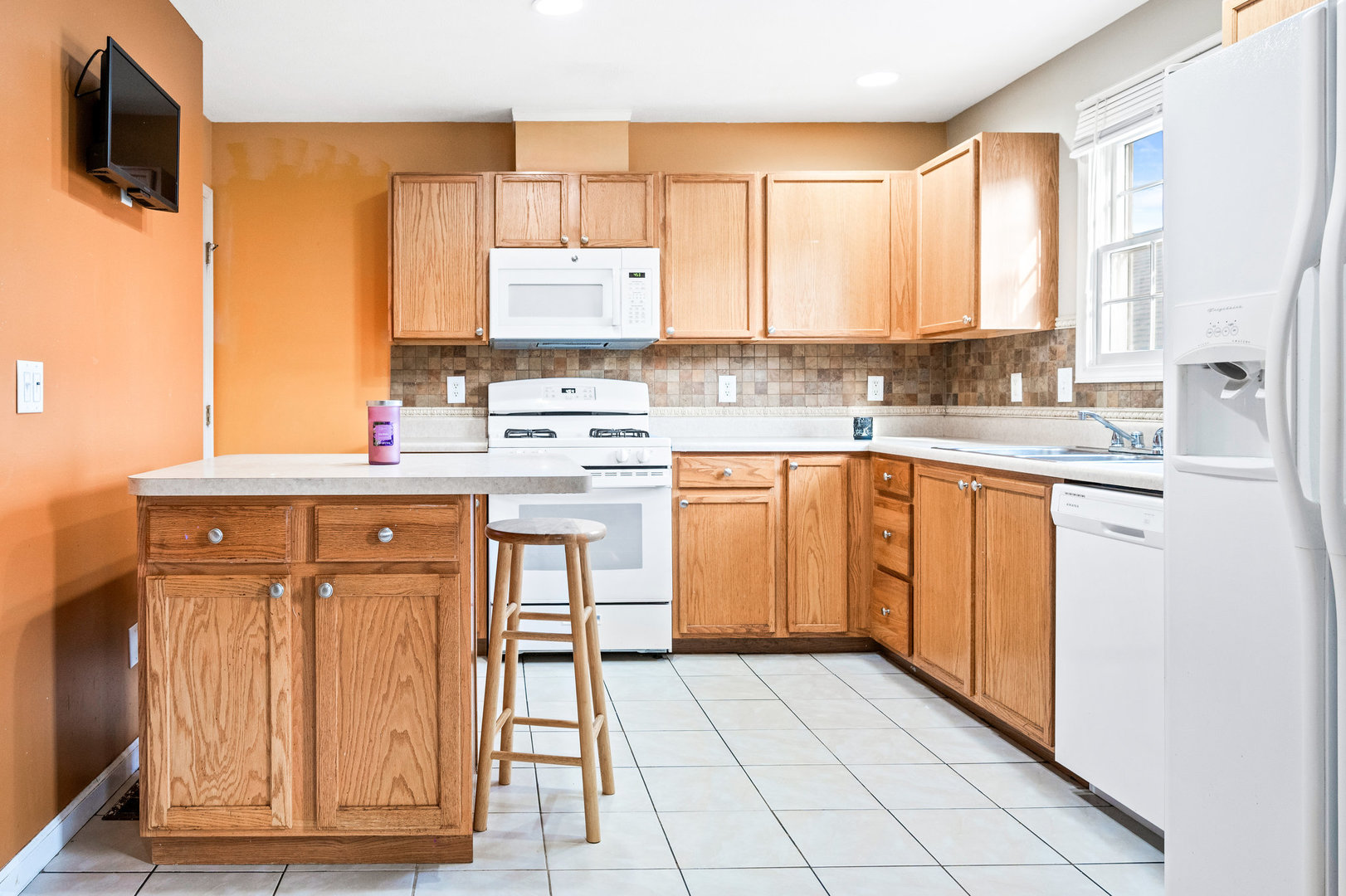 1109 East Shelbourne Drive Normal, IL 61761 - Photo 11 of 33 a kitchen with a sink stove and cabinets