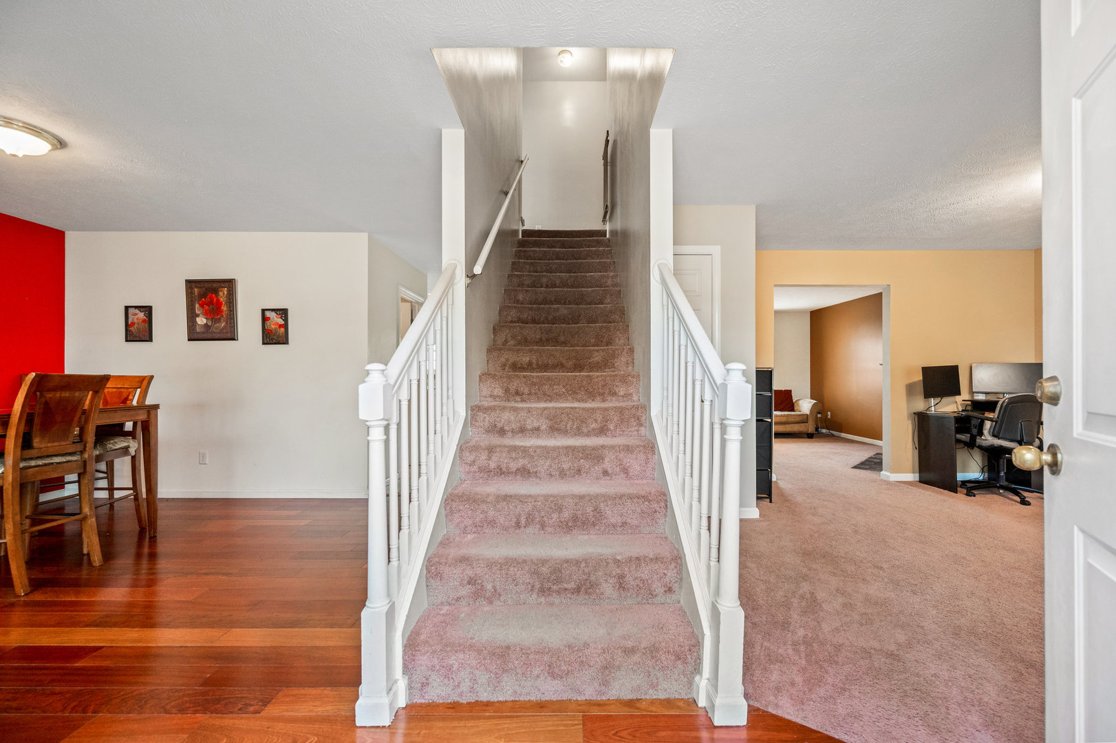 1109 East Shelbourne Drive Normal, IL 61761 - Photo 2 of 33 a view of entryway and hall with wooden floor