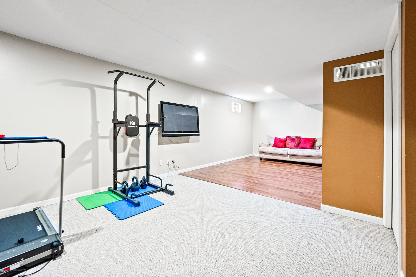 1109 East Shelbourne Drive Normal, IL 61761 - Photo 29 of 33 a living room with furniture and a flat screen tv