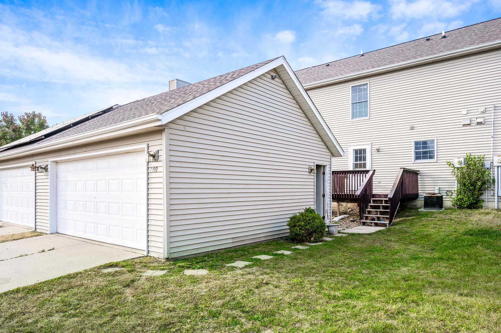 1109 East Shelbourne Drive Normal, IL 61761 - Photo 32 of 33 a view of a white house and a yard