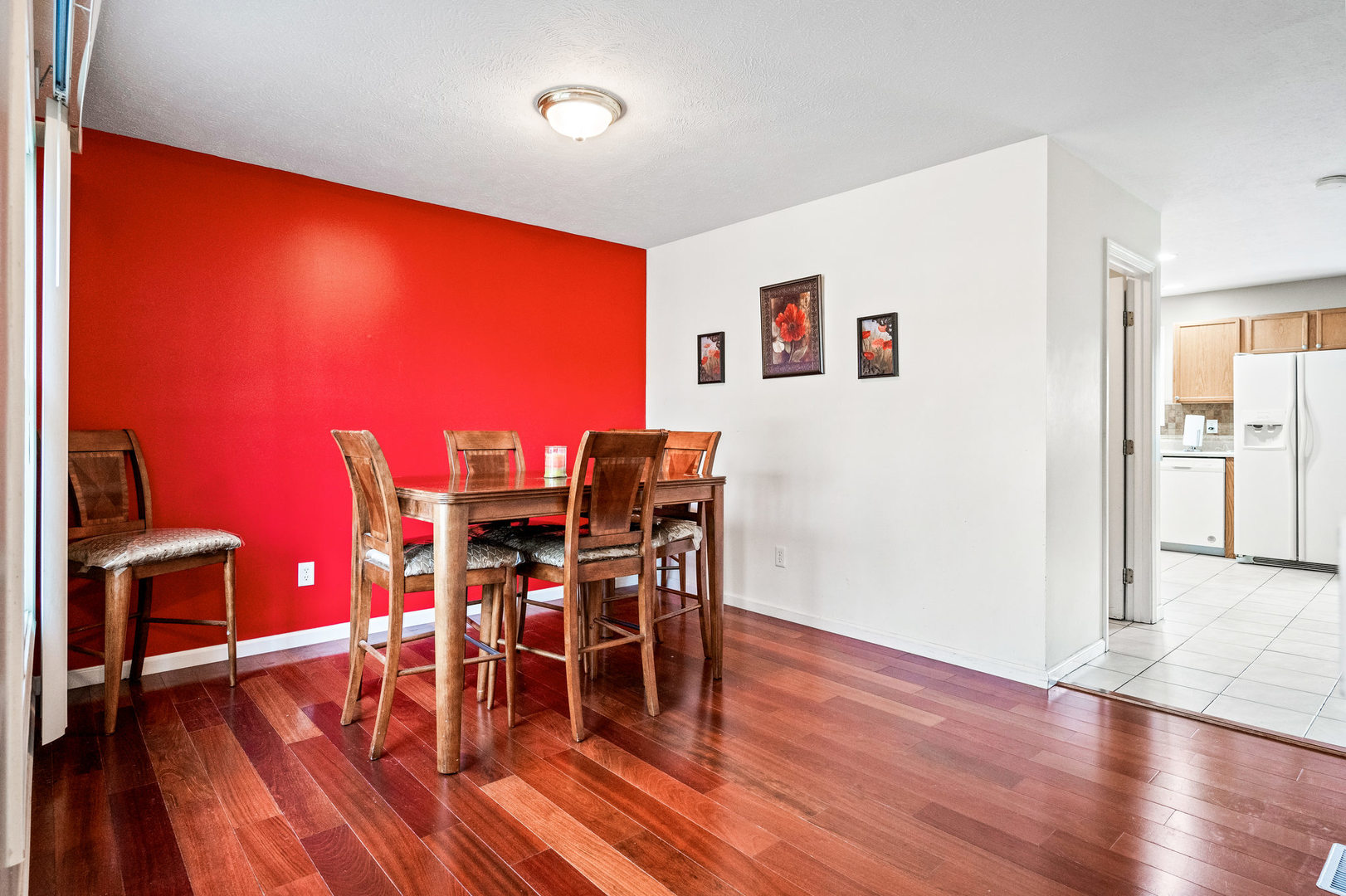 1109 East Shelbourne Drive Normal, IL 61761 - Photo 4 of 33 a view of a dining room with furniture and wooden floor