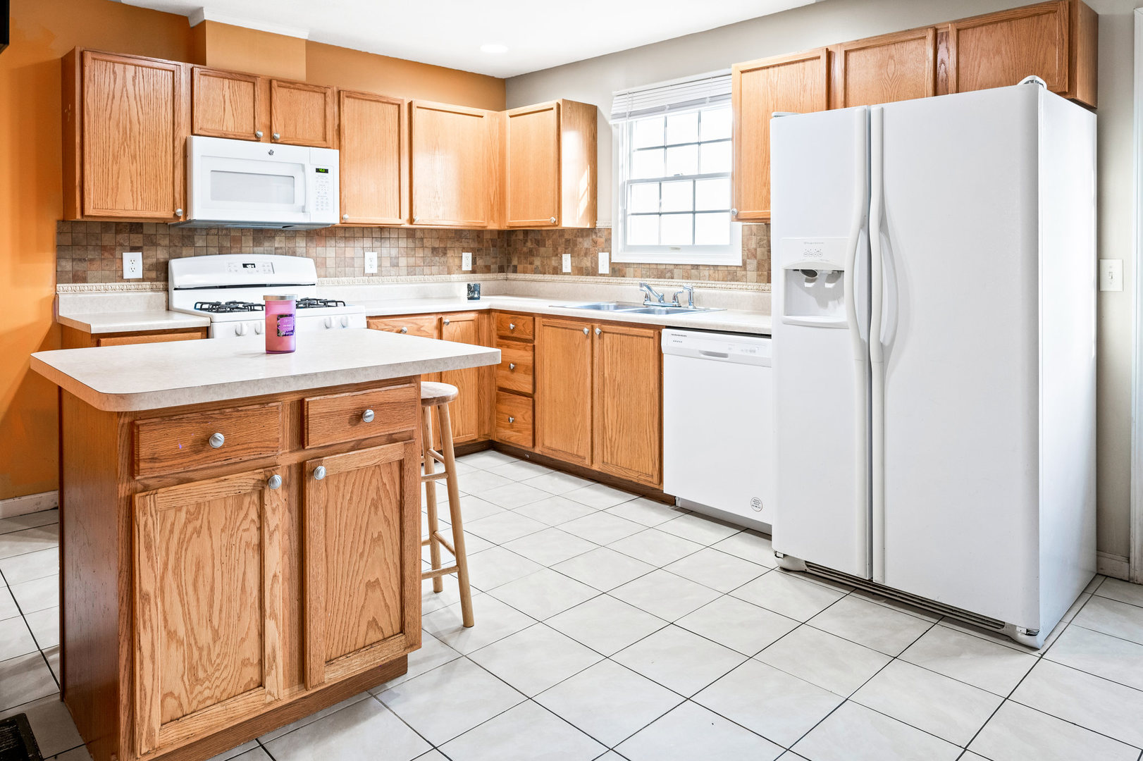 1109 East Shelbourne Drive Normal, IL 61761 - Photo 10 of 33 a kitchen with stainless steel appliances a refrigerator sink and cabinets