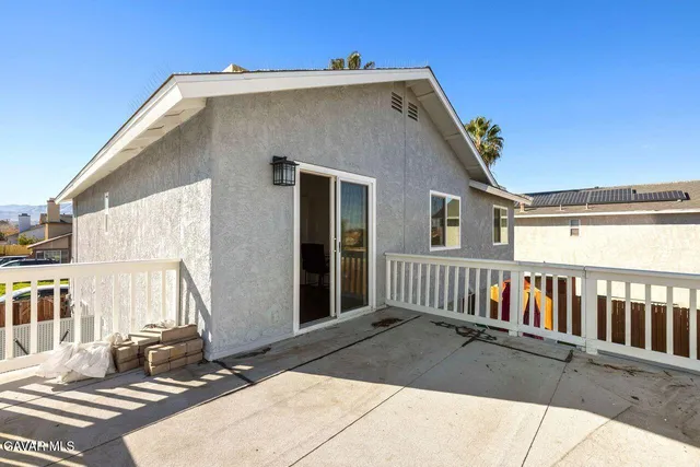 a view of a house with a roof deck