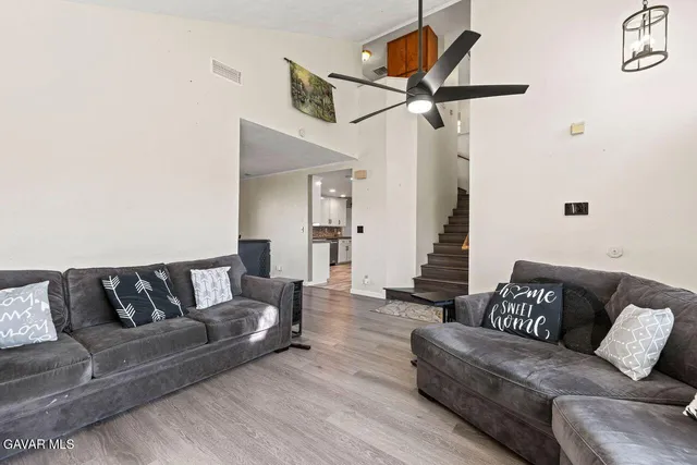 a living room with furniture and a couch