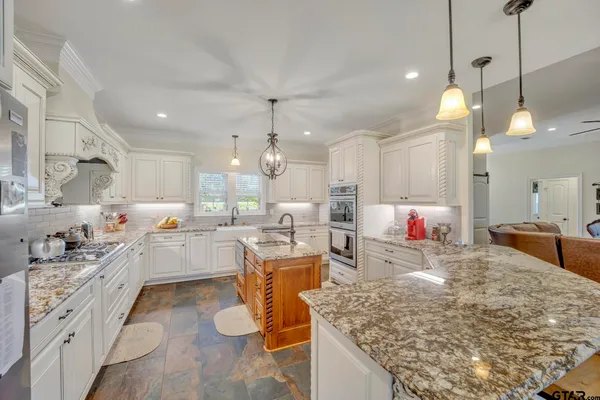 a large kitchen with lots of counter top space
