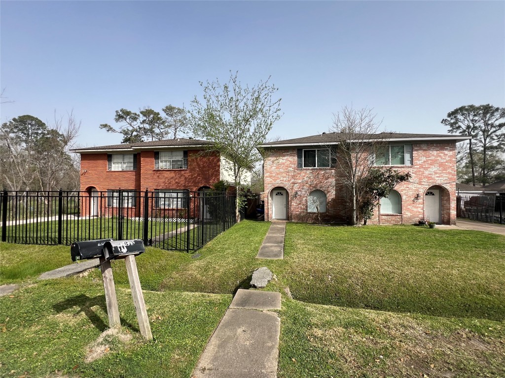 0 Verhalen Avenue Houston, TX 77039 - Photo 6 of 6 a front view of a house with garden