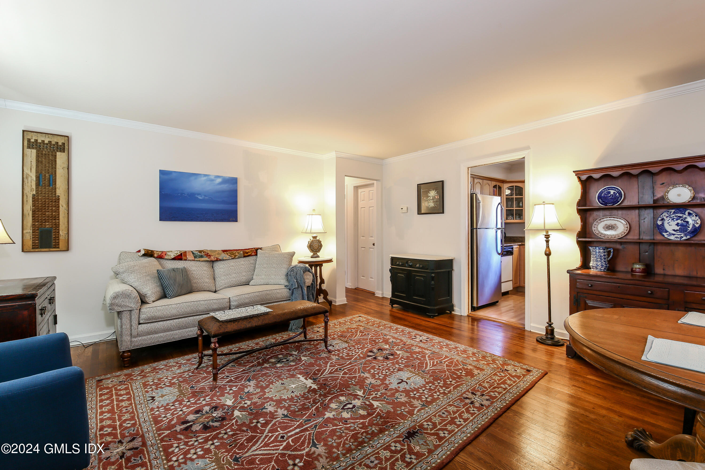 49 Valley Road, Unit D1 Cos Cob, CT 06807 - Photo 2 of 11 a living room with furniture and a fireplace