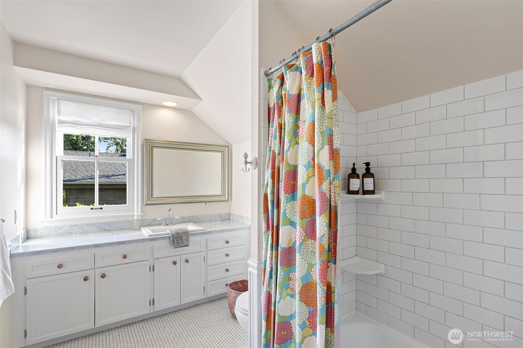 6641 Northeast Windermere Road Seattle, WA 98115 - Photo 28 of 38 a bathroom with a sink and a window