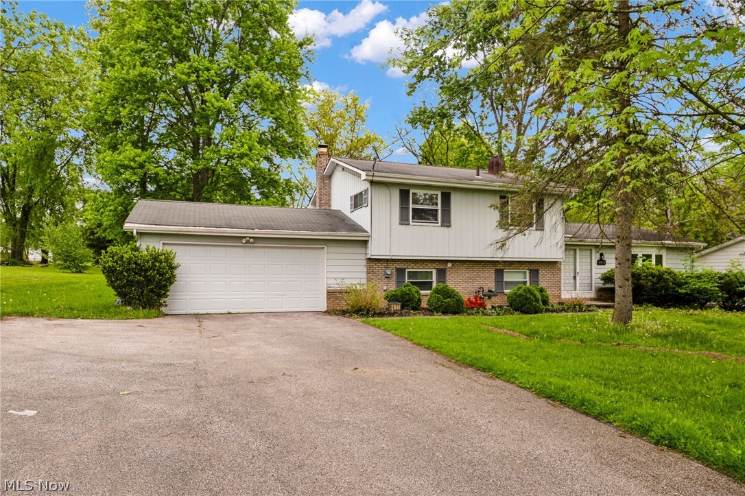 8451 Valley View Road Macedonia, OH 44056 - Photo 2 of 31 Split level home featuring a 2 car garage and a front lawn