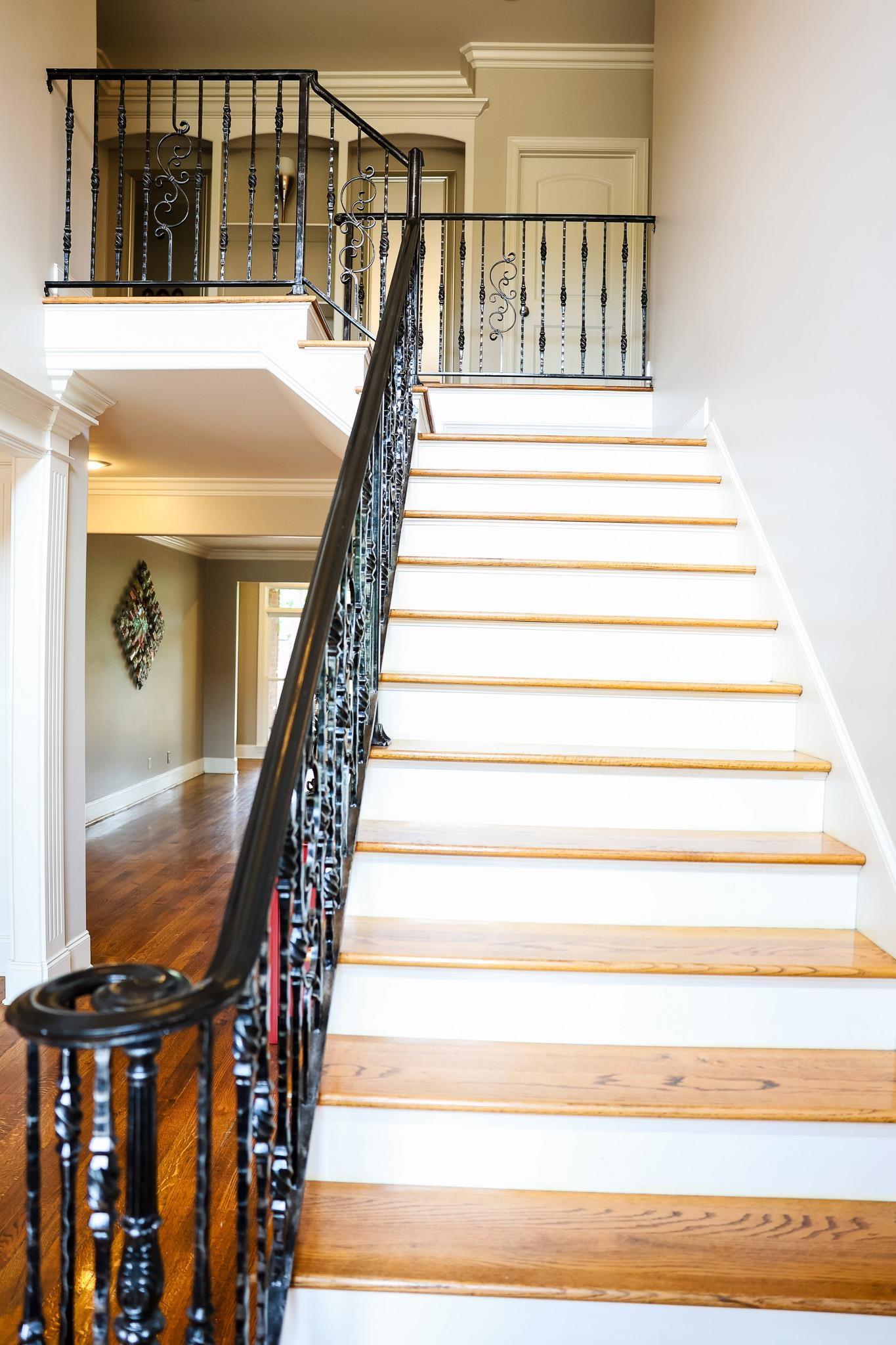 649 Ridge Springs Road Collierville, TN 38017 - Photo 9 of 35 Stairway with ornamental molding and wood finished floors