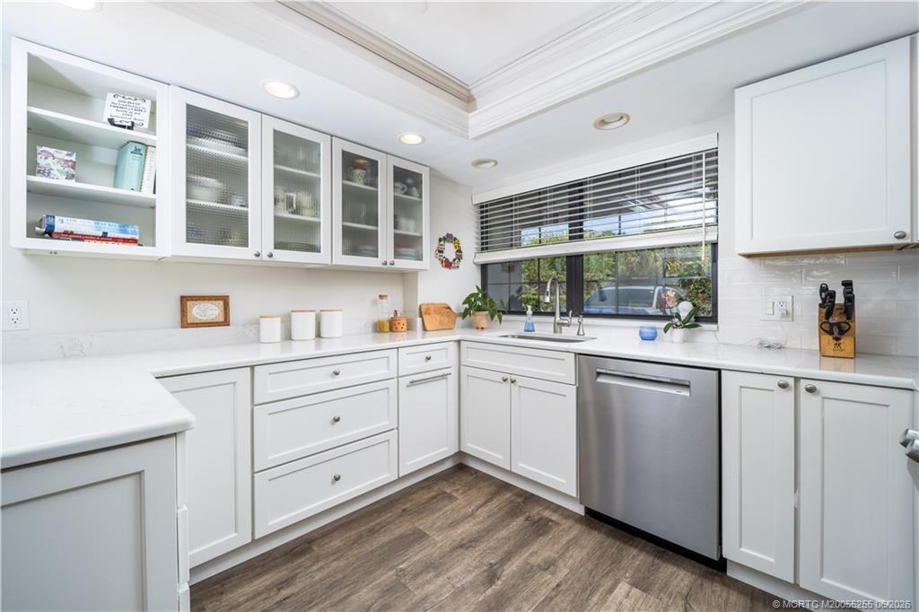 3100 Southeast Pruitt Road, Unit F101 Port St. Lucie, FL 34952 - Photo 17 of 37 Sleek cabinetry & subway tile splash