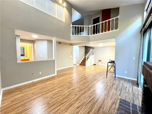 a view of a livingroom with wooden floor