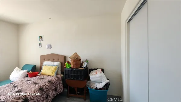 a bedroom with a bed and furniture