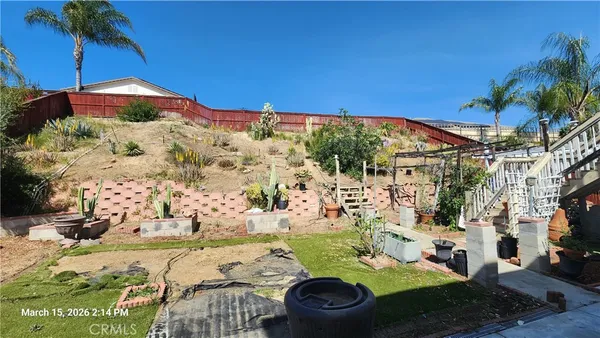 a view of swimming pool with a patio