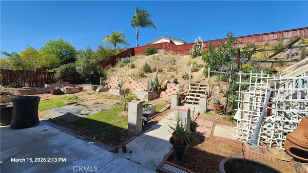 a view of swimming pool with a patio