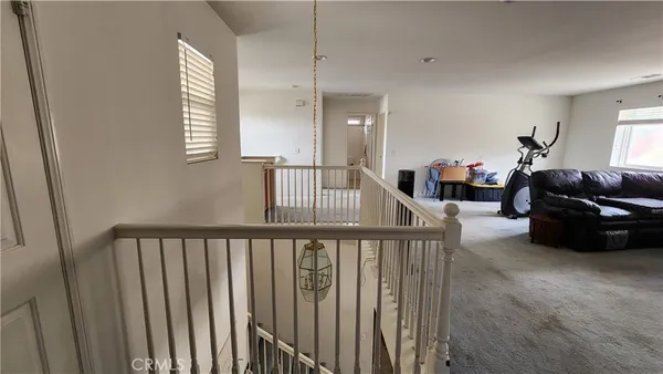 a view of living room and utility room