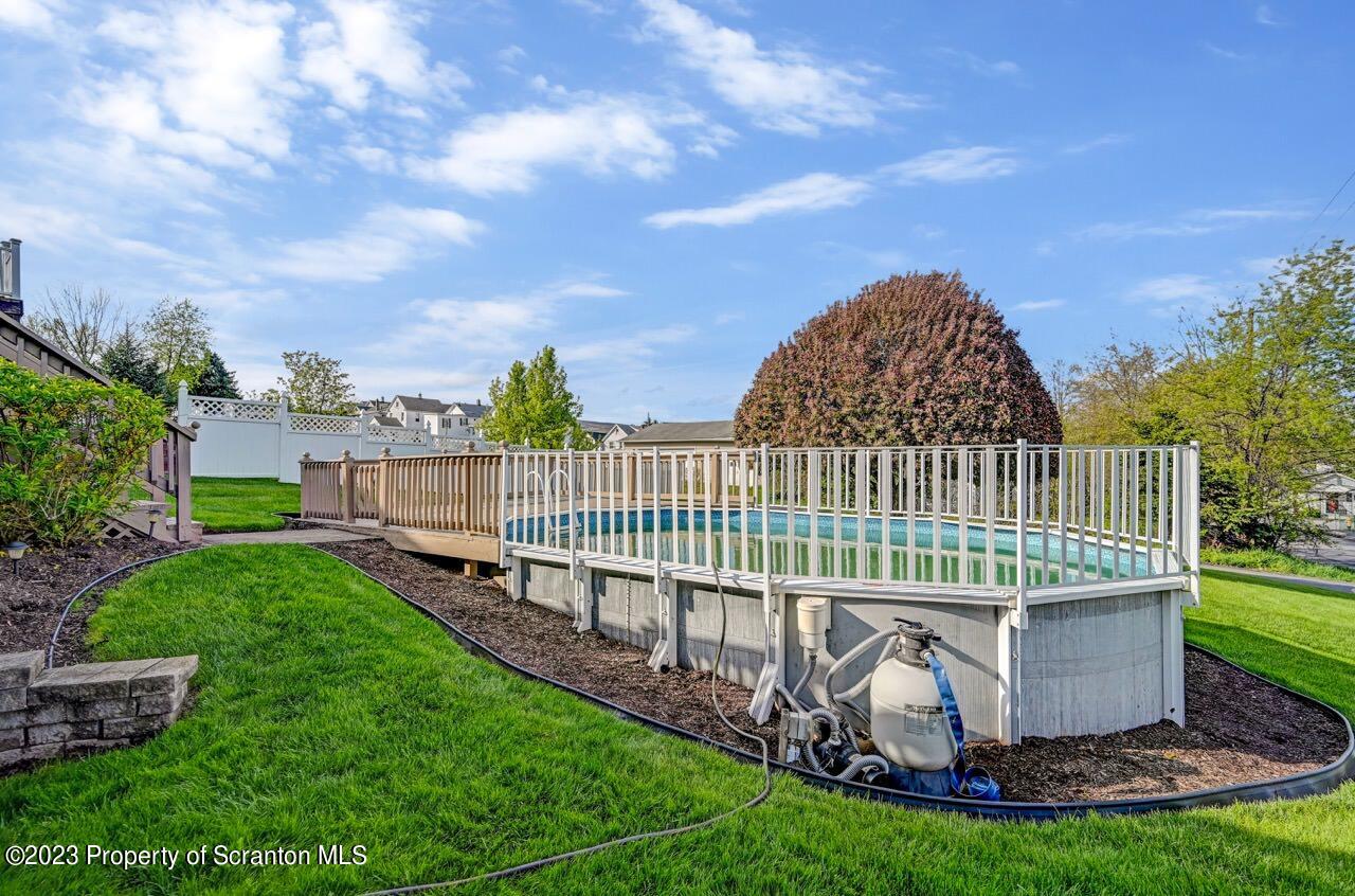 602 Eynon Street Scranton, PA 18504 - Photo 13 of 80 a view of a deck with a yard