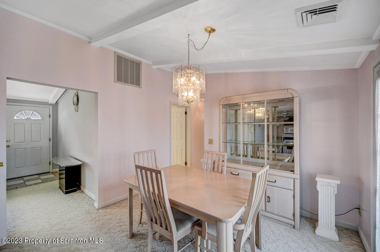 602 Eynon Street Scranton, PA 18504 - Photo 18 of 80 a view of a dining room with furniture window and outside view