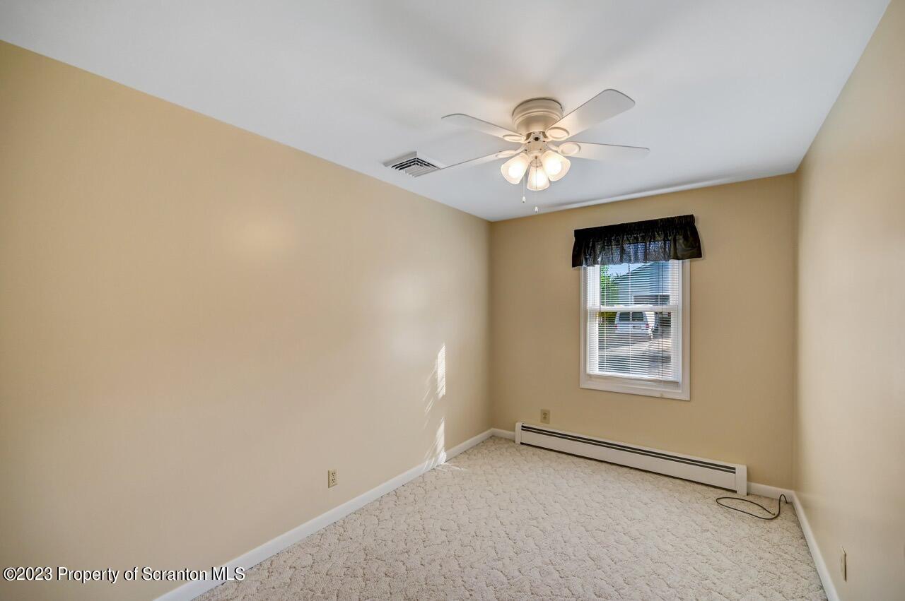 602 Eynon Street Scranton, PA 18504 - Photo 35 of 80 an empty room with windows and fan