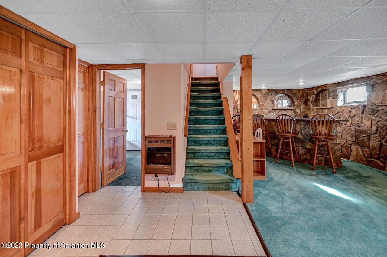 602 Eynon Street Scranton, PA 18504 - Photo 41 of 80 a view of a livingroom with furniture and staircase