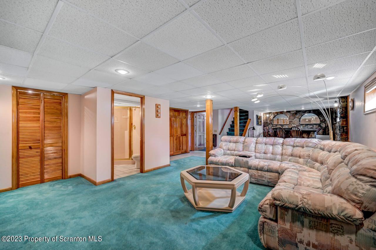 602 Eynon Street Scranton, PA 18504 - Photo 42 of 80 a living room with furniture and a yard