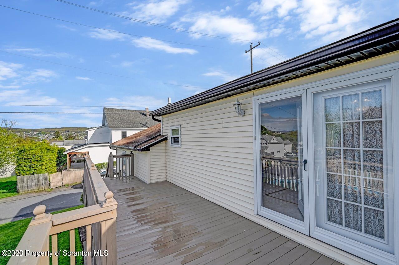 602 Eynon Street Scranton, PA 18504 - Photo 53 of 80 a view of balcony with wooden floor and fence