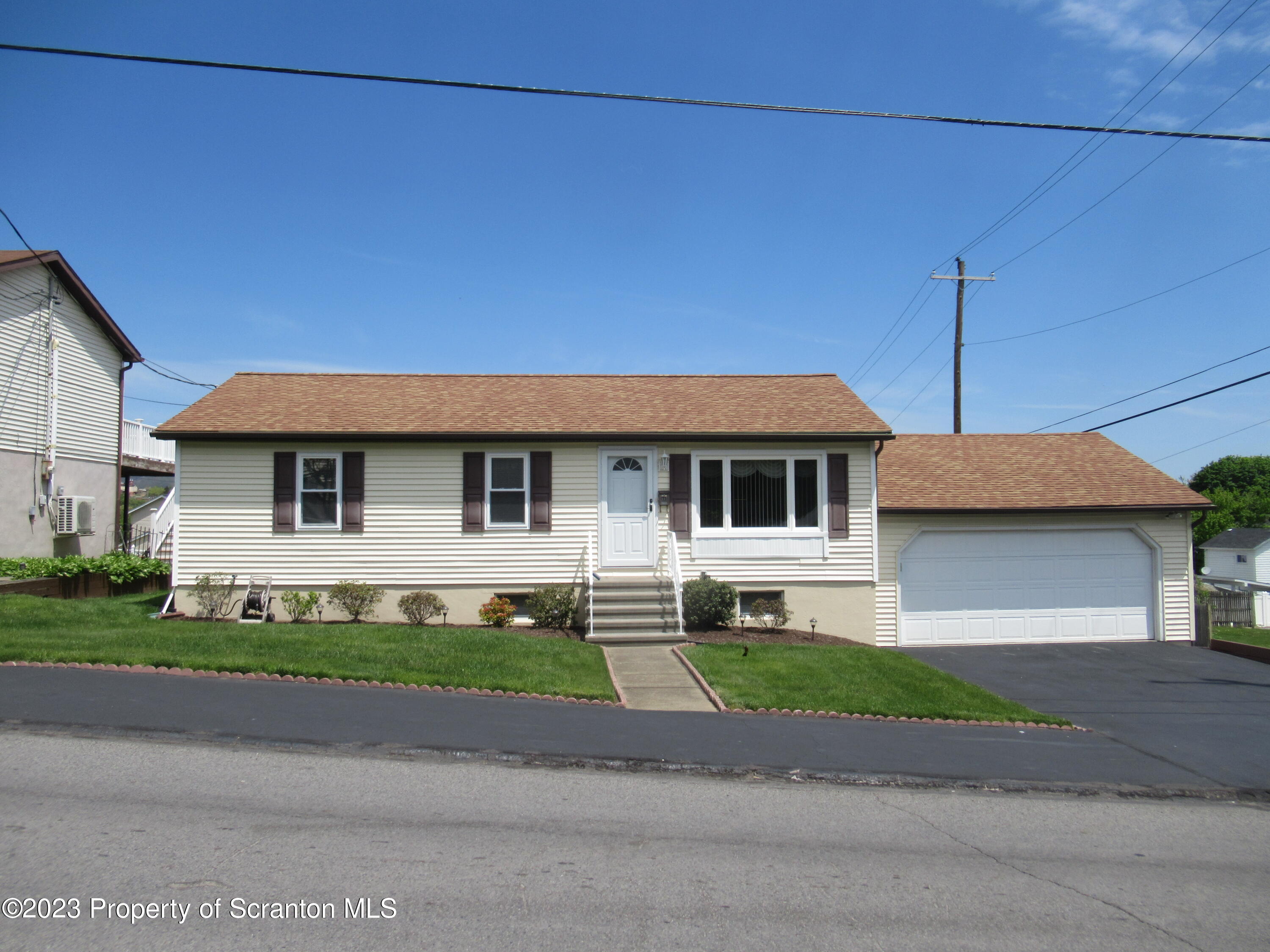 602 Eynon Street Scranton, PA 18504 - Photo 66 of 80 a front view of a house with a yard